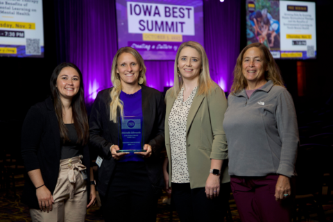 Group of women with award recipient