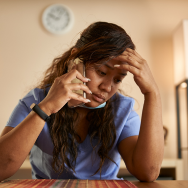 woman distraught on phone