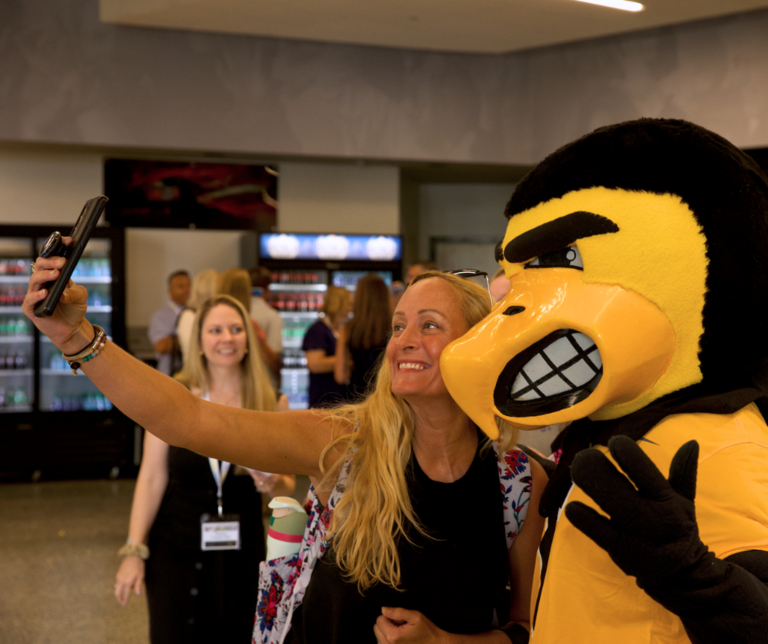 woman posing with Herky