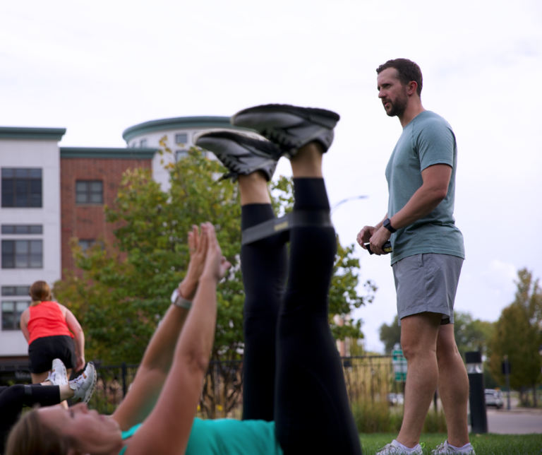 man watching outdoor workout class