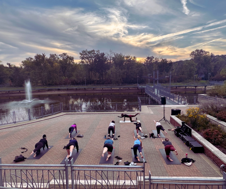 people doing yoga outside