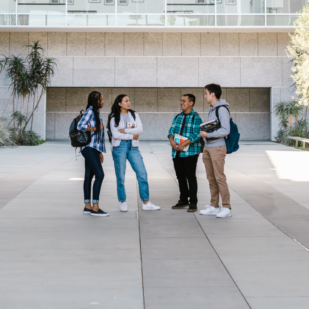 students standing and talking