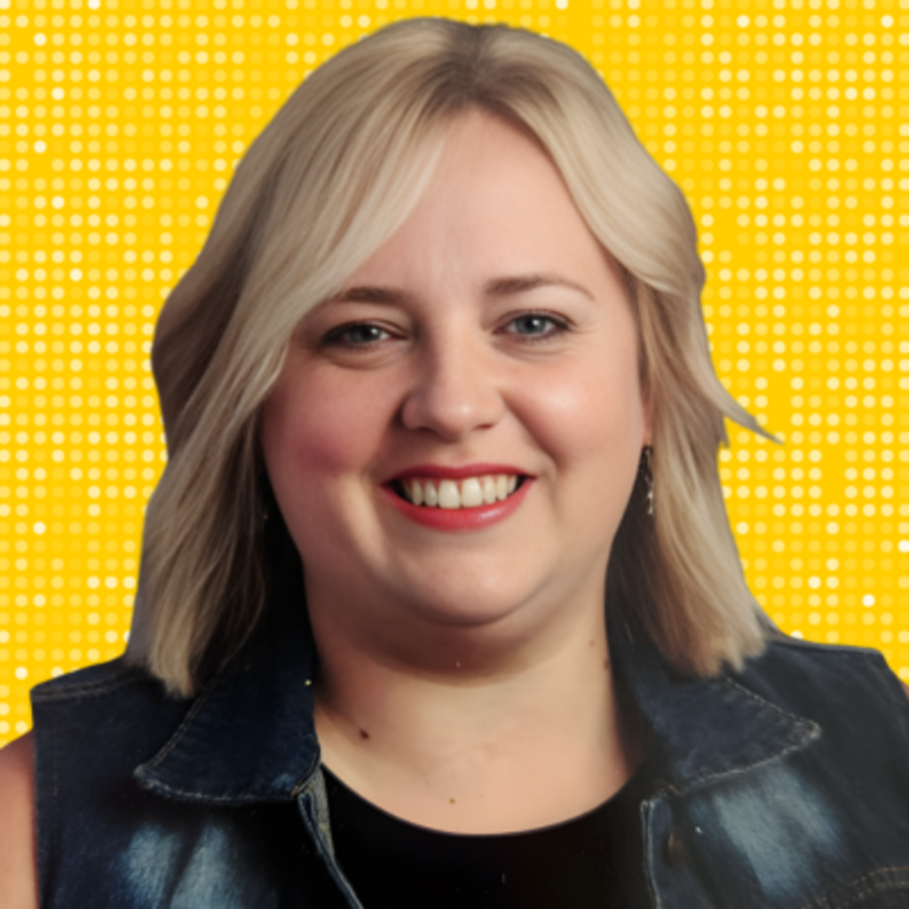 A photo of Kelli Johnson looking into the camera smiling with a yellow and white background