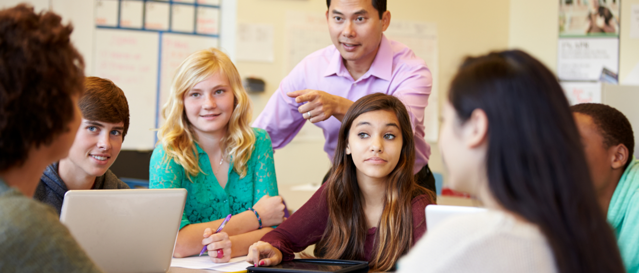 students and teacher in classroom