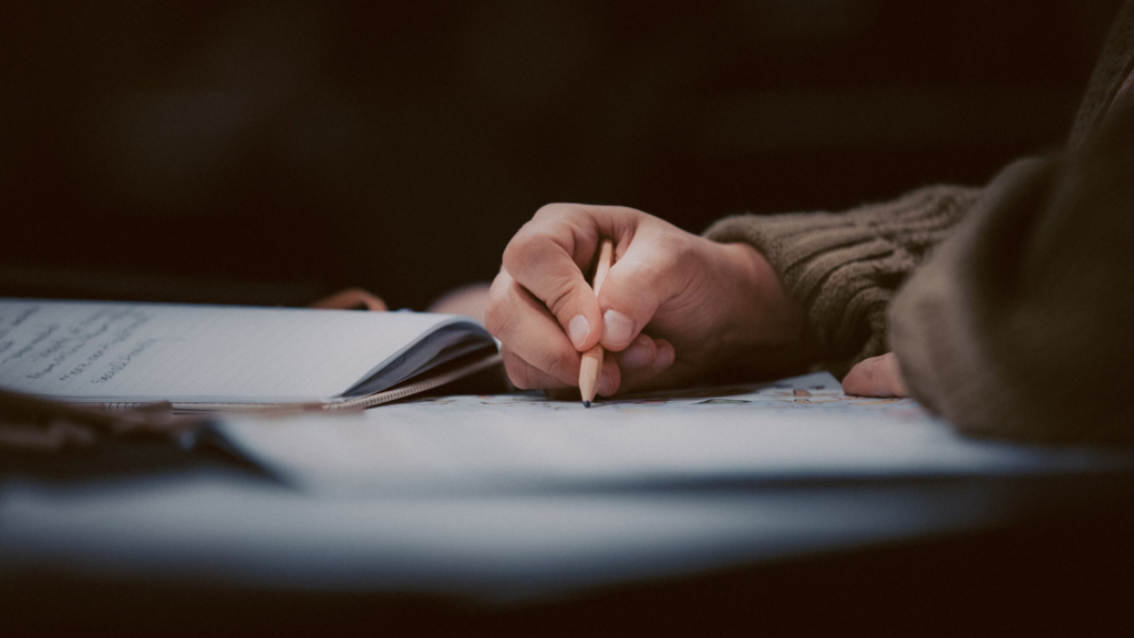 hand writing in a notebook