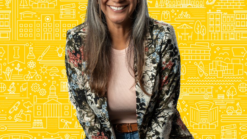 Mario Bruno sitting on a stool with a yellow textured background
