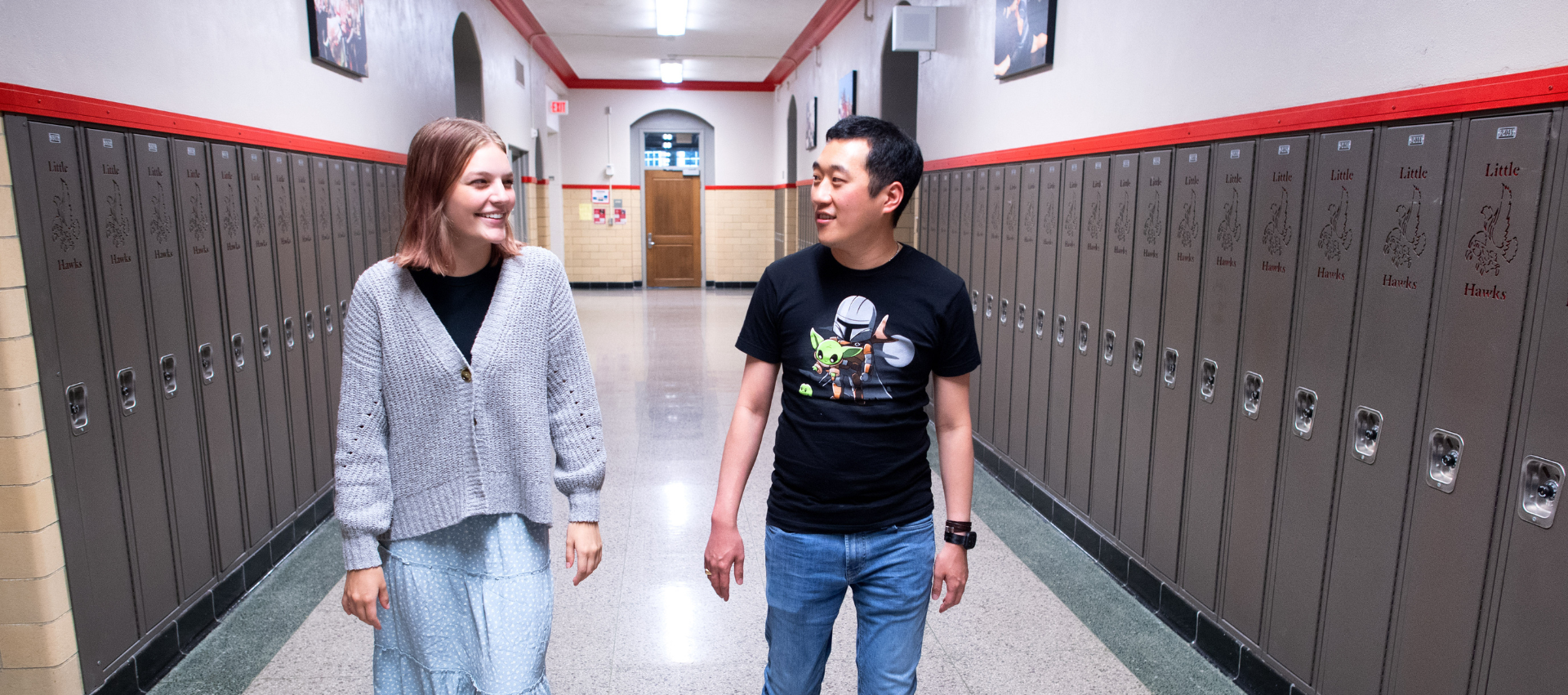 Image: Student and teacher walking in hallway